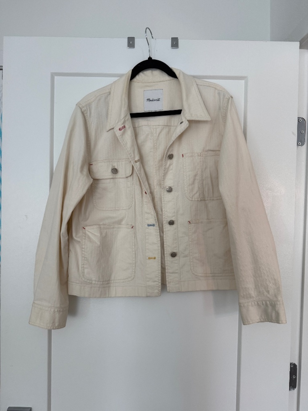 Madewell white chore coat with colorful stitching